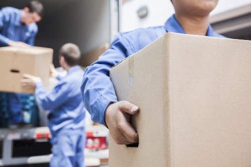 Professional team handling piano removals in Harringay