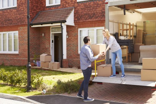 Careful loading of goods into a van during a house move