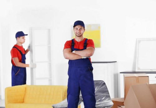 Moving boxes and household items being organised for a van move