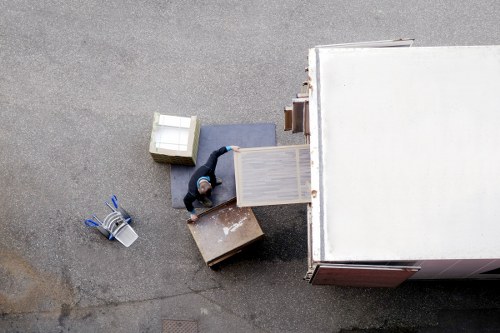 Efficient man with van moving furniture in North London