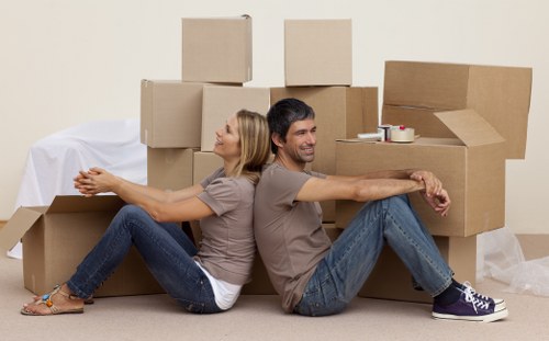 Office move preparation in Harringay with labelled boxes and packed workstations