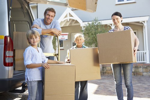 Packing and loading household items into a van