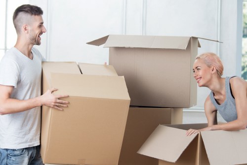 Professional movers loading furniture in Harringay