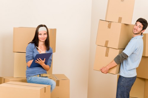 Loading boxes and furniture into a van near Harringay