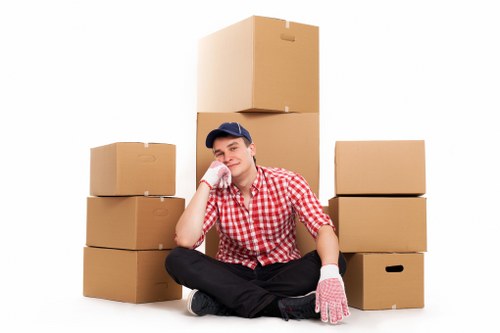 Packed boxes and furniture ready for a moving truck in Harringay